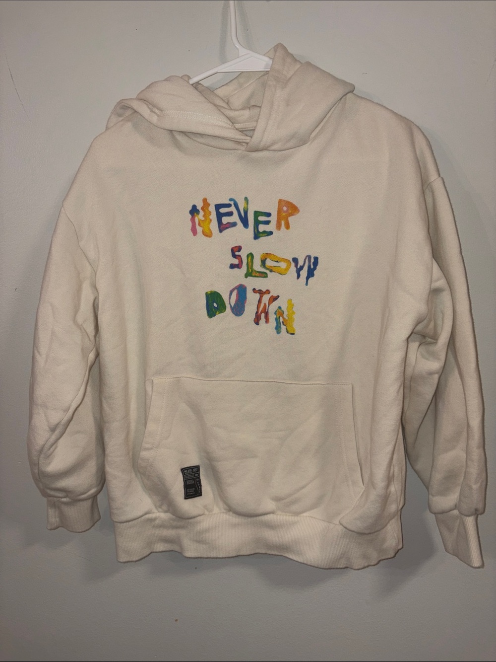 Zara Cream Hoodie with Bright Multicolor 'Never Slow Down' Graphic